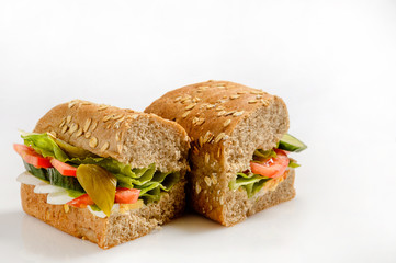 Fresh healthy vegetarian sandwich on white background