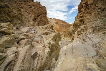 hikink the golden canyon - gower gulch circuit in death valley, california, usa