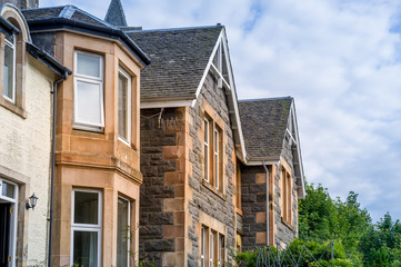 Traditional houses old street of Oban. Hebrides islands, Scotland.