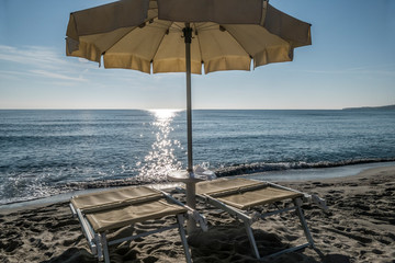 the beach  of La Caletta, in Siniscola (Sardinia) Italy with umbrella