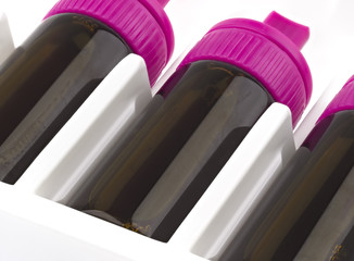 Brown vials with violet lid