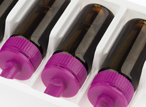 Brown vials with violet lid