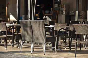 empty chairs and tables in a restaurant