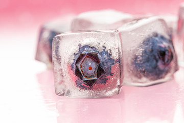 Ice cubes with berry for summer cocktails © fotofabrika