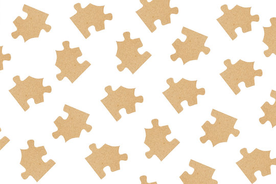 Cardboard puzzles as a background close up.