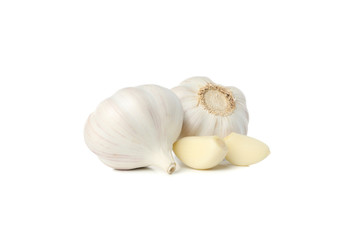 Fresh garlic bulbs and slices isolated on white background