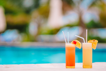 Two tasty cocktails on tropical white beach