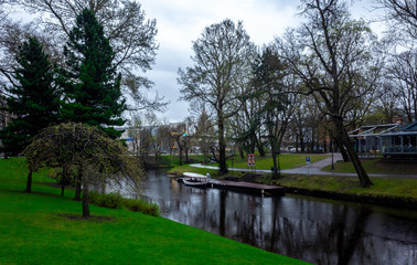 Fototapeta na wymiar April 25, 2018 Riga, Latvia. City canal in a park Bastejkalns in Riga.