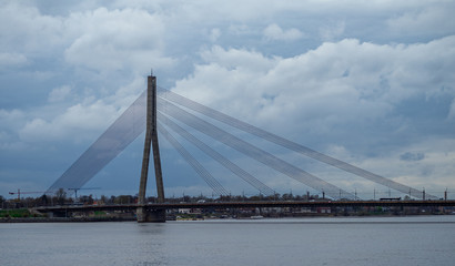 Fototapeta na wymiar April 24, 2018 Riga, Latvia. Cable-stayed cable bridge over the Daugava River in Riga.