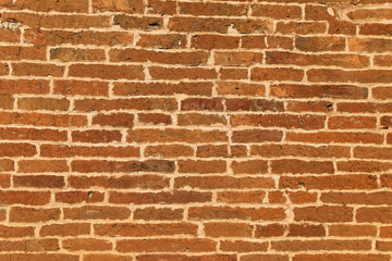 The texture of a brick wall of a thousand years old on an ancient pagoda in Burma