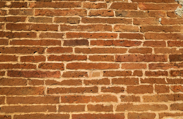 Fototapeta premium The texture of a brick wall of a thousand years old on an ancient pagoda in Burma