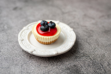 Mini cheesecake with blueberry and cherry topping sweet summer treat