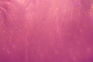 caustic effect, play of shadows on a crimson background