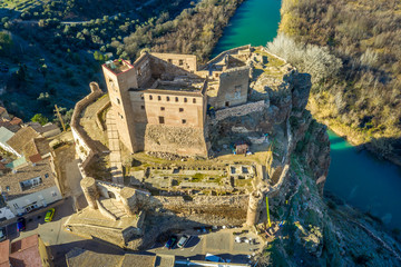 Aerial ground plan view of medieval partially restored Cofrentes castle above the Cabriel river in...