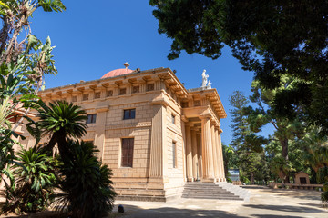 Obraz premium Main building in Botanical garden of Gymnasium, Conservatory and University of Palermo capital in Sicily island in summertime