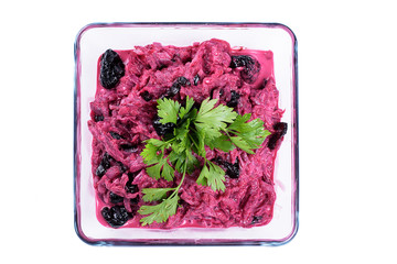 beet salad raisin in a glass plate