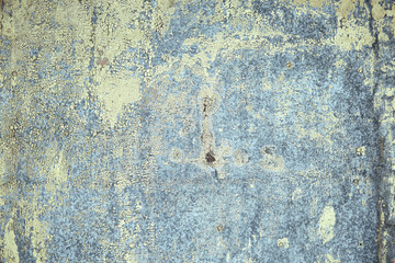 Metal texture, rusty metal with peeling paint, pieces of metal with welds. Background, copy space.