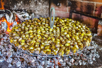 Grilled snails called cargolade in the south of France