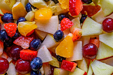 Different fresh fruits as ingredients for the vegan and healthy cuisine.