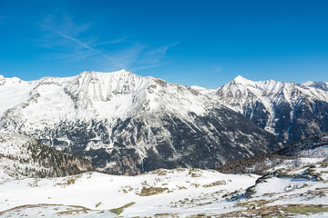 Spectacular winter mountain panorama high in austrian alps.
