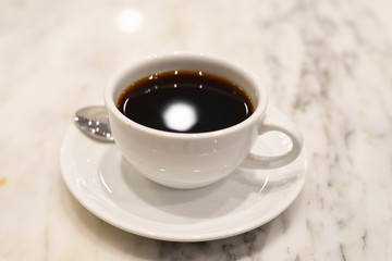 Hot americano coffee in white glass for beverage background
