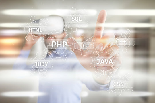 Web development tools concept on virtual screen. Programming language and scripts. PHP, SQL, HTML, Java and others.