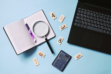 Flat lay business photo. Notepad, notebook, calculator