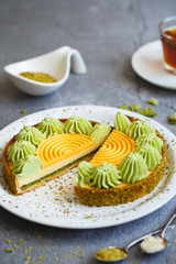 Delicious mini tarts with nuts and custard. Assortment of delicious and colorful dessert, salted caramel tart, lemon curd tart, cherry cream chocolate tart made by pastry chef. Sweet food.