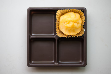 Closed up Eclair bakery in tray