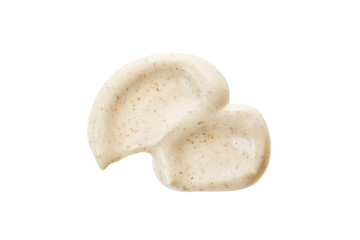 White face scrub mask smear with dark particles isolated on white. Natural cosmetic exfoliation facial mask smudge sample. skin care spa treatment