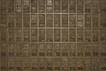 Antique mailboxes. Copper mailboxes in the post office.