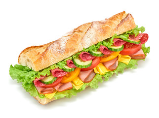 Fresh submarine sandwich with ham, cheese, salami, tomato, lettuce salad, cucumber isolated on...