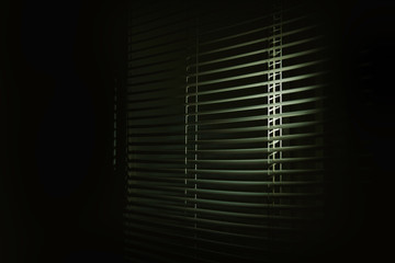 Blinds in the dark black background