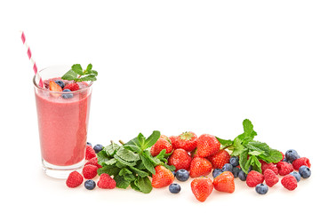 Berry fruits detox fresh strawberry smoothie. Colorful healthy eating diet concept. Mixed red berries vegan smoothie health food background. Strawberry, raspberry, blueberry isolated on white