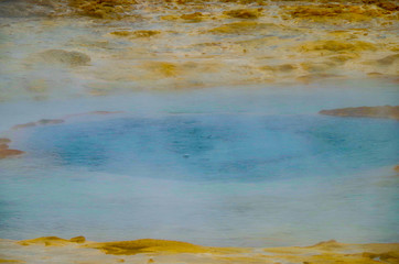 Hot volcanic springs and geothermal area Blesi around famous Strokkur geysir in National Park on...