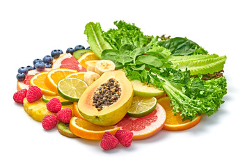 Tropical fresh fruits green salad healthy eating layout. Mixed vegan juicy food concept. Creative set pineapple, orange, avocado berries isolated on white. Colorful freshness fruit slices