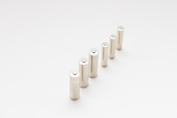 glad of the AA accumulator batteries on a white background