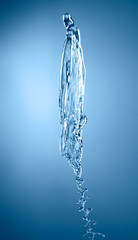 blue color water splash isolated on empty background, studio photo