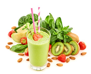 Healthy fresh fruit berry smoothie in glass. Raw assorted ingredients isolated on white. Tasty strawberry, green spinach, kiwi fruits background, creative vegan smoothie concept.
