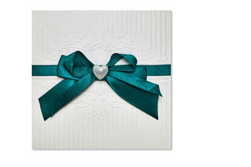 Valentine's Day, a white envelope with green ribbons and heart