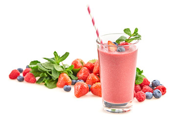 Berry smoothie, healthy juicy pink vitamin drink, diet or vegan food concept. Freshly blended homemade fruit vitamins refreshing juicy cocktail. Tasty smoothie with organic berries on white