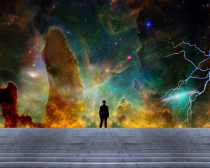 Sci-fi composition. Stargazer. Man in classic suit and bowler hat stands before vivid space with colorful nebulae and galaxies