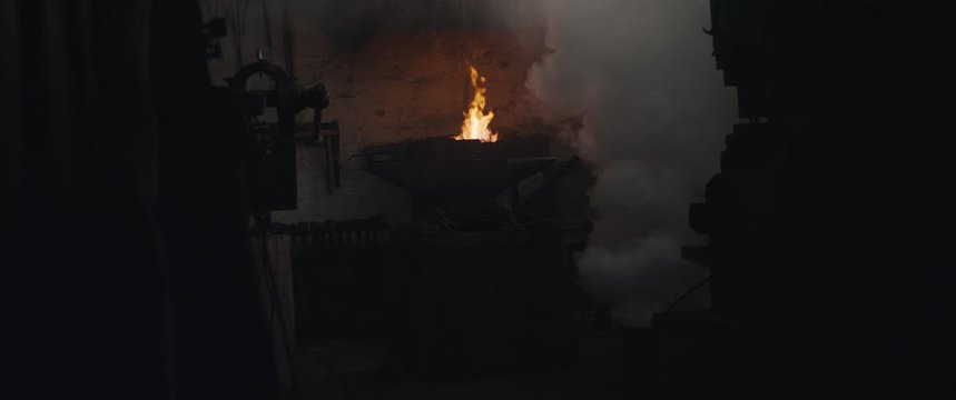 Blacksmith's workshop full of smoke haze dark eerie widescreen cinemascope