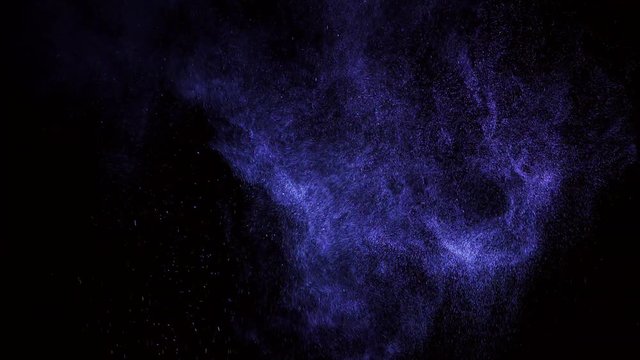 Perfume cloud on black background in slow motion