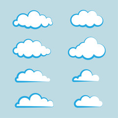 Set of clouds in flat design isolated on blue background. Cartoon modern white clouds