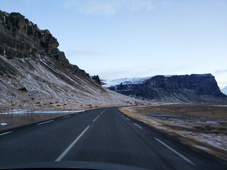 Picturesque winter landscape of Iceland. The perfect road to perspective