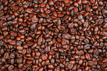 Close up roasted coffee beans background