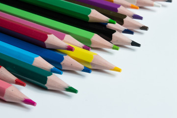 Fototapeta premium multicolored pencils on a white background.