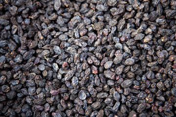 Tasty grape raisins. Dried fruit dried berries.