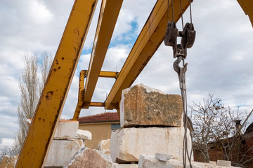 Cranes and marble in a marble factory